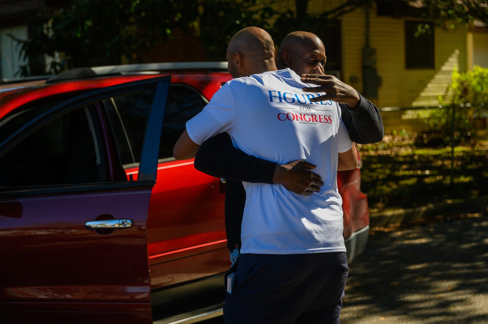 Shomari Figures greeting a supporter