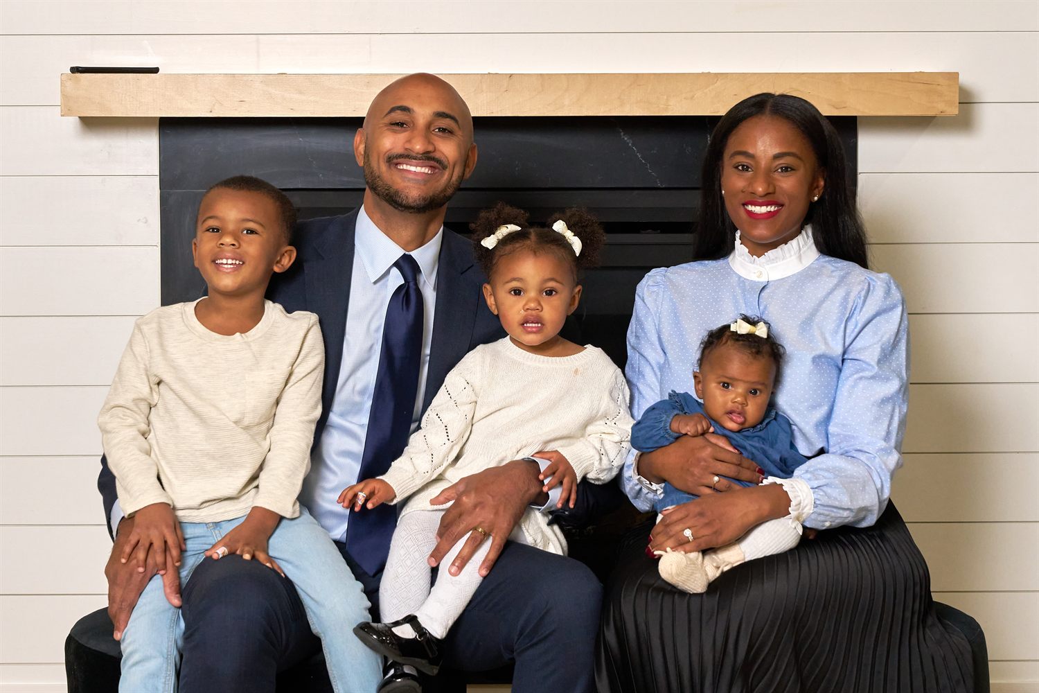 Shomari Figures with his wife, Dr. Kalisha Dessources Figures, and their three children