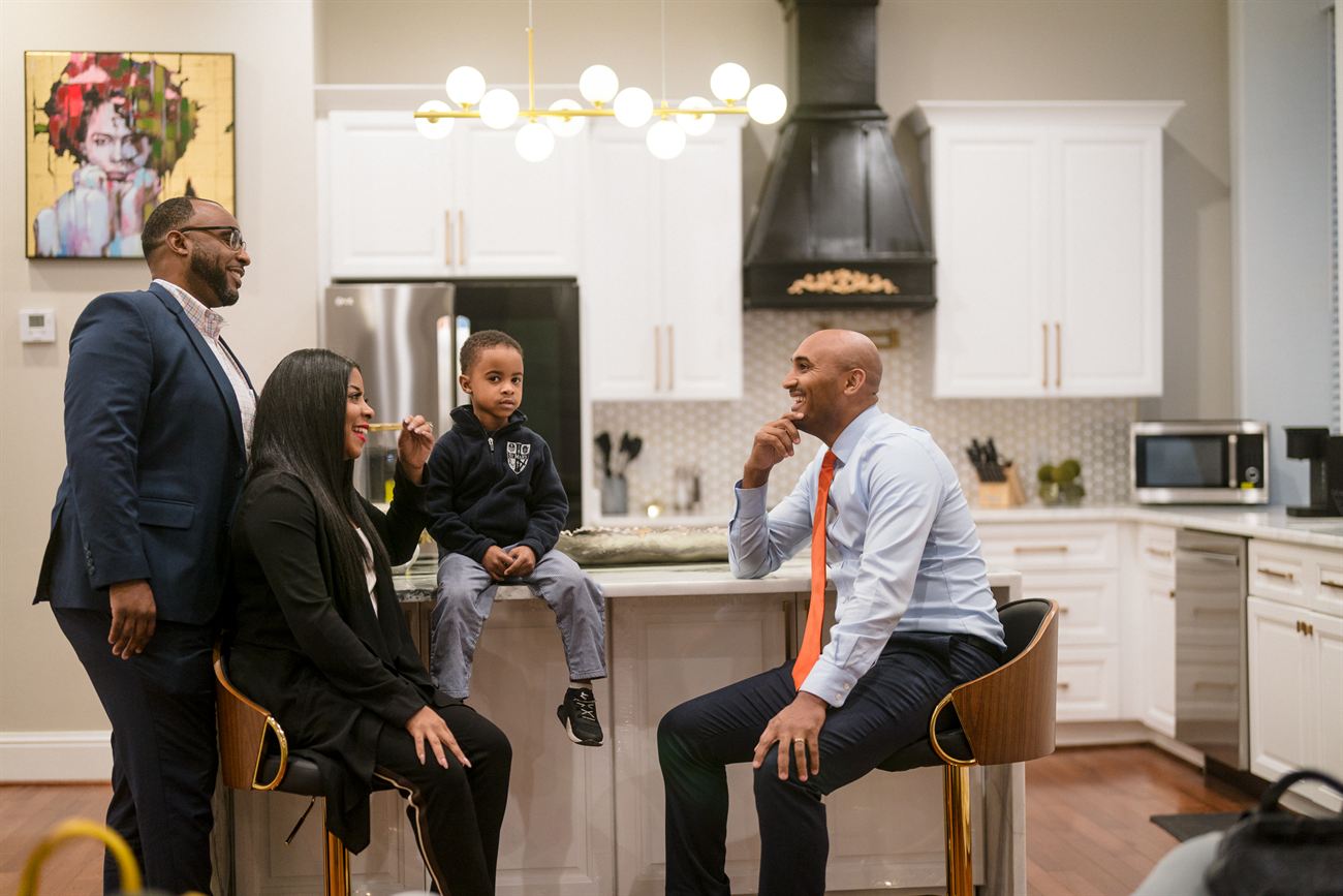 Shomari Figures at home with family and friends