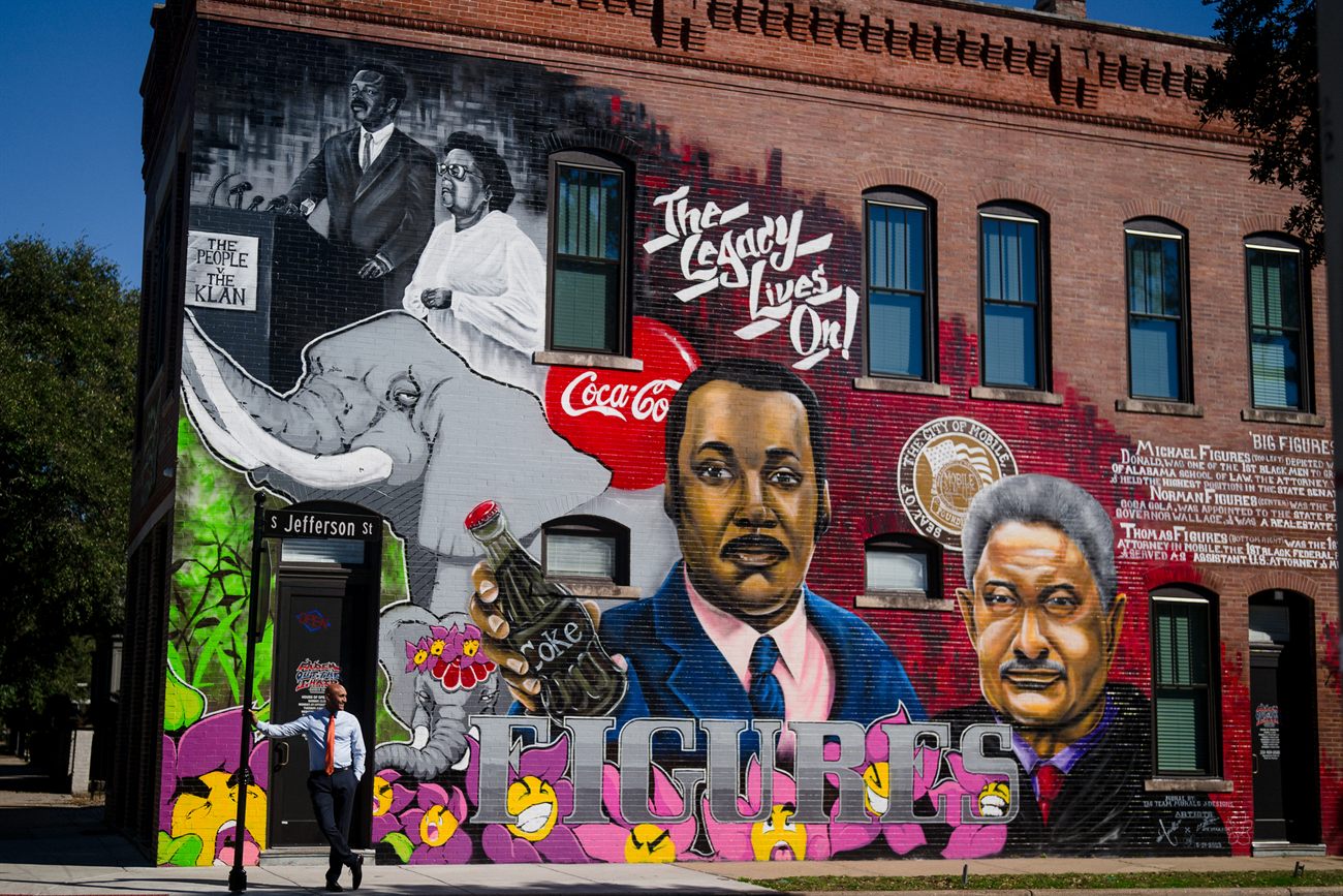 Shomari Figures at the Figures family legacy mural